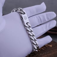 Men's polished stainless steel Cuban link bracelet with engraved Valknut clasp