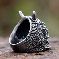 Another side profile of the horned cyclops skull ring, emphasizing the deep contours and single eye socket.