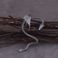 Angled view highlighting the antiqued finish on dragon wing ear cuff