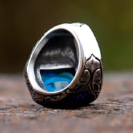 Lifestyle view of the vintage black CZ stainless steel signet ring worn on a hand