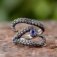 Vintage stainless steel octopus tentacle ring with blue zircon accent