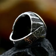 Detailed view of the 316L stainless steel Turkish signet ring band featuring sword-like gold accent and textured patterns.
