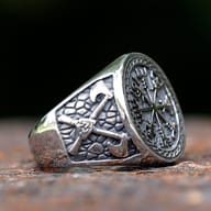 Angled perspective showing the oxidized antique finish and thickness of the Viking compass ring