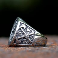 Close-up of the Vegvisir runic symbol on the round face of the stainless steel signet ring