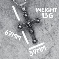 Detail of the central skull emblem on the 316L stainless steel cross pendant
