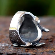 Detailed view of the lower half of the Oni mask ring, showing fangs and mouth.