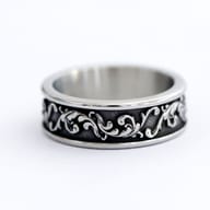 Top-down view of the durable stainless steel ring with its unique spindrift pattern and polished finish.