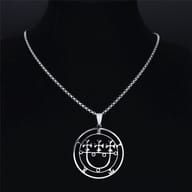 Close-up of the pendant's bail and top ring, highlighting the chain attachment.