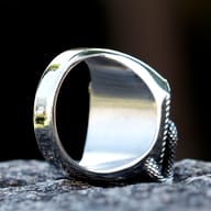 Detailed view of the 3D snake's head and body on the Gothic ring, emphasizing the craftsmanship and dark aesthetic.