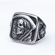 Detailed view of the hooded skull's face on the vintage stainless steel ring.