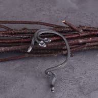 Pair of Viking three-headed snake ear wraps showing left and right ear symmetry