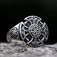Celtic knot cross steel ring shown worn on a man's finger