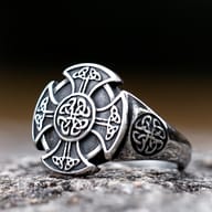 Top-down view highlighting the circular knot medallion on the steel ring