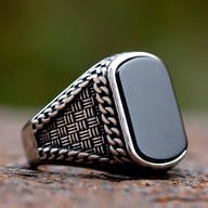 Side view of the stainless steel men's ring, highlighting the textured band design.