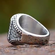 Stainless steel ring for men showcasing the smooth, rectangular black onyx-like stone.