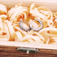 Close up of textured octopus suckers on stainless steel hoop earrings