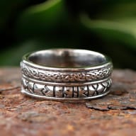 Close-up of the smooth, reflective inner surface of the 316L stainless steel ring, showing its polished finish.