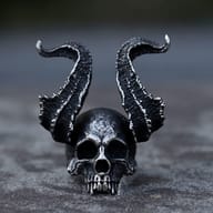 Front view of men's 316L stainless steel horned skull ring with textured horns