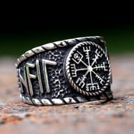 Top-down view of the circular Vegvisir compass emblem on a steel signet ring