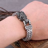 Detailed angle of the wolf jaw latch closure on the stainless steel band