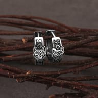 Side profile of the stainless steel wolf hoop earring showing the secure hinge clasp mechanism