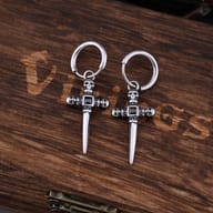 Side profile of gothic dagger skull earrings showcasing durable 316L stainless steel construction