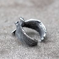 Close-up of the eagle head and claw detailing on the stainless steel ring