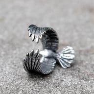 Top-down angle of the men's flying eagle stainless steel statement ring
