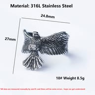 Flying eagle 316L stainless steel ring resting on a rugged stone surface