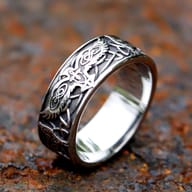 Side view of the stainless steel ring, displaying the full intricate Nordic eagle and knotwork pattern