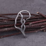 Detailed shot showing the realistic texture and tapered tip of the steel tentacle earring
