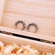 Side profile showing the secure hinge clasp on the stainless steel barbed wire hoops