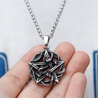 Close-up of the top portion of the stainless steel snake pentagram pendant, highlighting the bail
