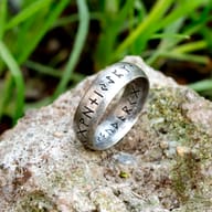 Viking rune band ring displayed on a neutral background