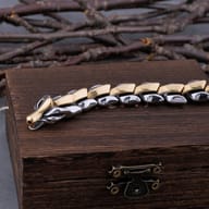 Side angle of the polished dragon bone spine chain bracelet