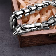 Close up view of interlocking 316L stainless steel dragon scale links