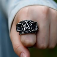 View of the sturdy construction and unique pentagram symbol of the men's stainless steel gothic ring.