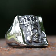 Side profile of 316L stainless steel skull signet ring showing thick band construction