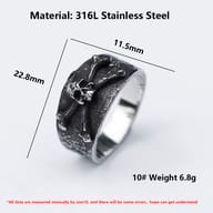 Angled view of the substantial 316L stainless steel skull ring, with a focus on its rugged texture and design elements.