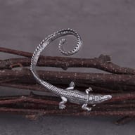 Back view of the crocodile ear cuff showing earring post and curved tail structure
