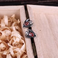 Side profile angle of the gothic skull stud earring showcasing 316L stainless steel construction
