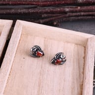 Back view of the stainless steel skull stud earrings highlighting the friction post backings