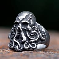Gothic octopus skull men's ring made from antique silver-tone stainless steel, front view.