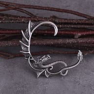 Top-down view of the dragon wrap earrings highlighting the anatomical ear curve design