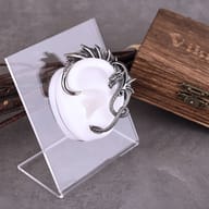 Side view showing the curved hook silhouette of the stainless steel dragon ear wrap
