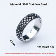 Profile view of the rugged men's dragon ring with a shiny inner band.