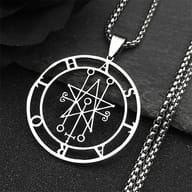 Astaroth Sigil Goetia 316L stainless steel pendant with chain on a dark textured surface.