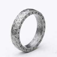 Silver-toned stainless steel Viking rune ring with a unique faceted, geometric texture.
