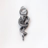 Detailed shot of halo bail and coiled serpent wrapping the flower stem