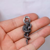 Back view showing solid construction and smooth finish of the stainless steel pendant
